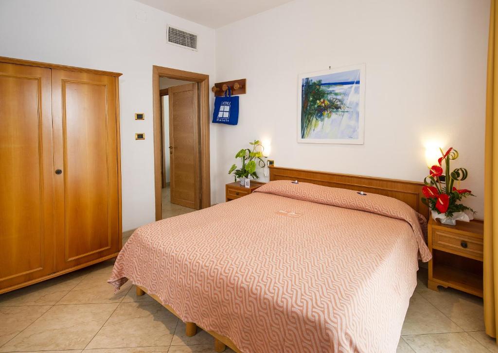 Postel nebo postele na pokoji v ubytování Joli Park Hotel - Caroli Hotels