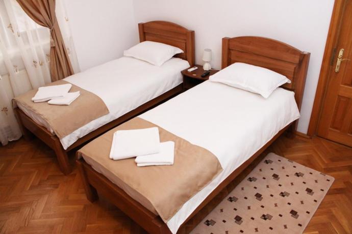 Voodi või voodid majutusasutuse Casa Craiova Nuova toas