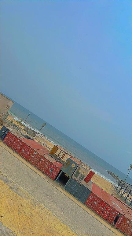 a group of colorful containers sitting next to each other at Ocean View Lekki Ikate in Alaguntan