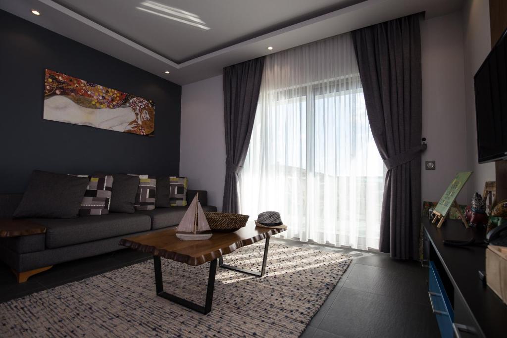 TV a/nebo společenská místnost v ubytování Degirmenburnu Residence