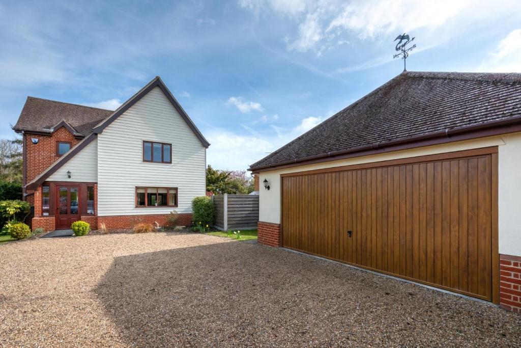 a detached house with a garage at 3 Bed in Walberswick oc-htroy2 in Walberswick