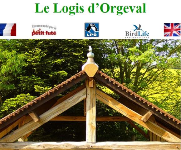 a picture of the top of a wooden building at Le Logis d Orgeval in Orgeval