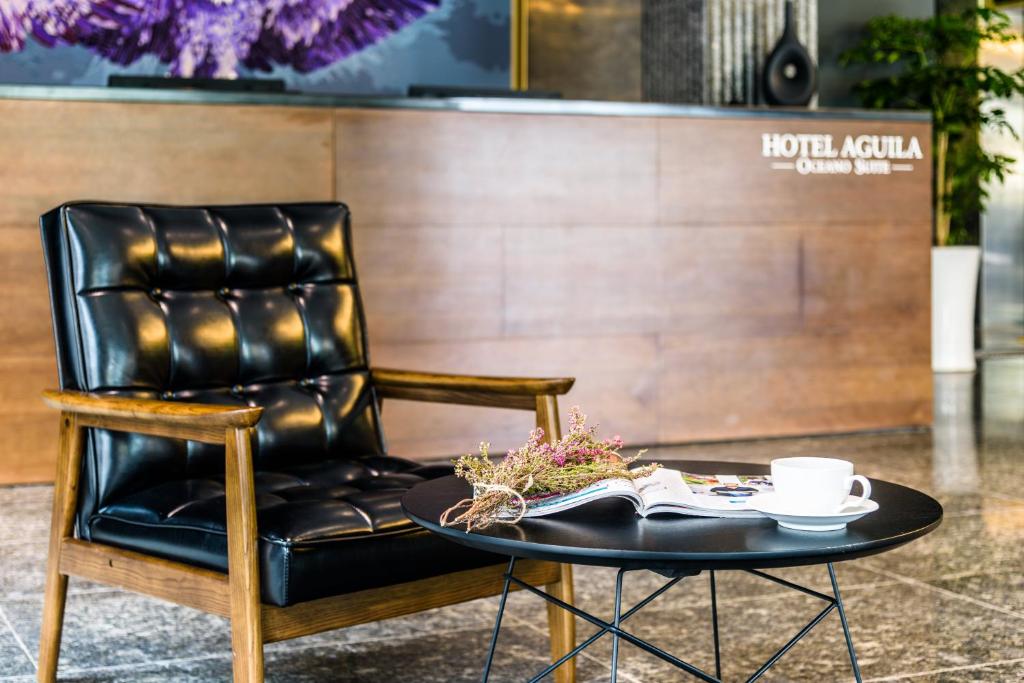 Posezení v ubytování Aguila Hotel Jeju Oceano Suite