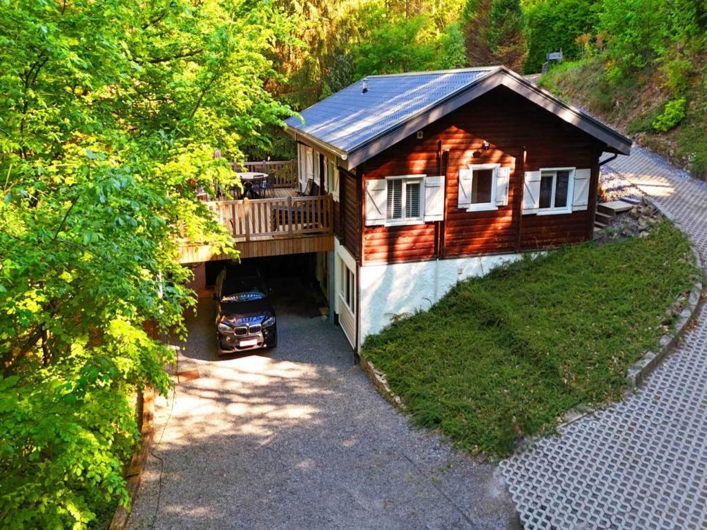 an overhead view of a house with a car parked outside at Chalet in Manhay for 9 Person in Manhay