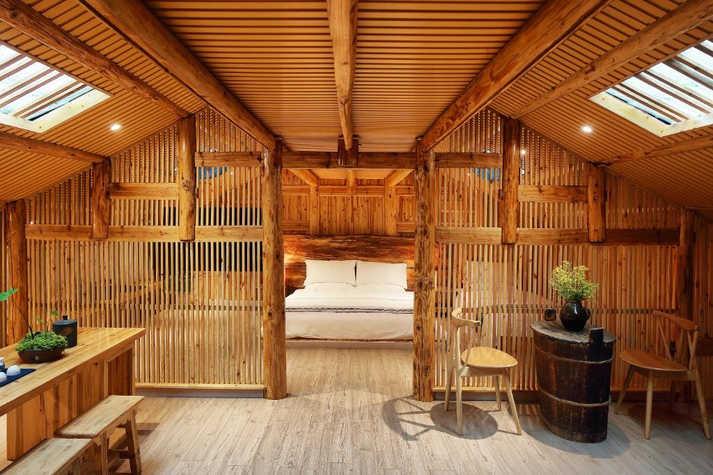 Postel nebo postele na pokoji v ubytování Tong Sang Art Hotel