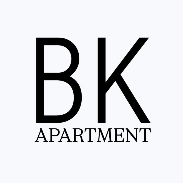 un logo per un ristorante con la lettera k e la parola onement di BK Apartment a Xánthi