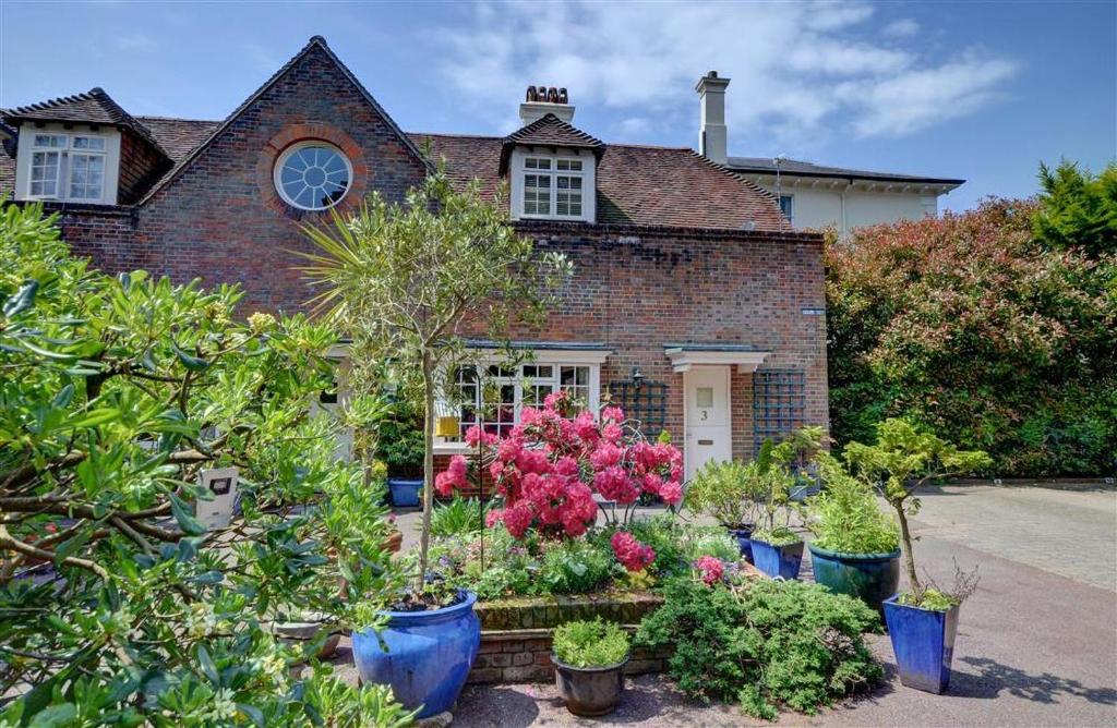 a house with many potted plants in front of it at 2 Bed in Tunbridge Wells oc-tw660 in Royal Tunbridge Wells