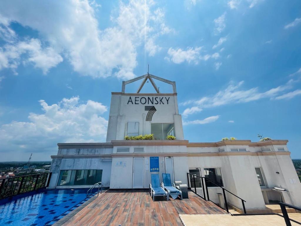 a building with a sign on top of it at Liyasha Villa - AEONSKY in Negombo