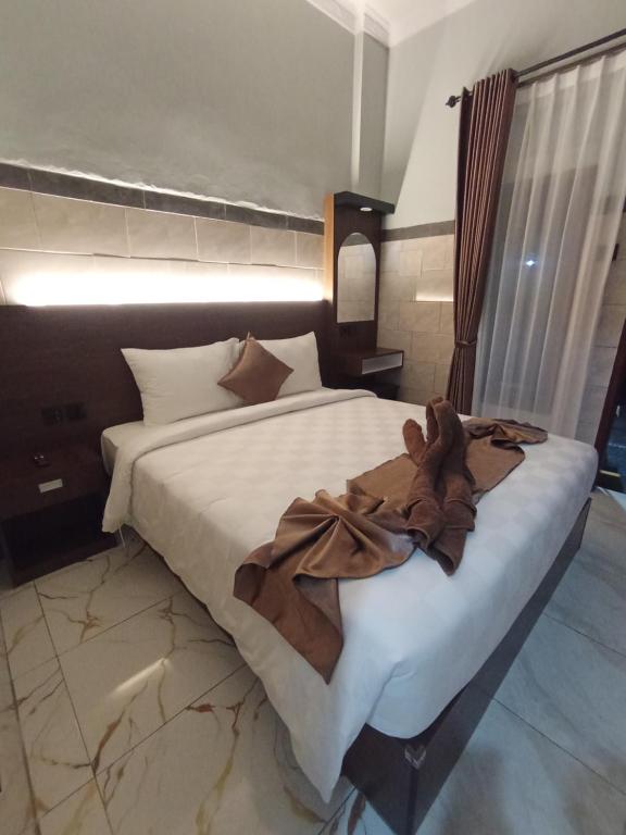 فضای داخلی TirtaSuci Guest House در بالی - تصویر ۳