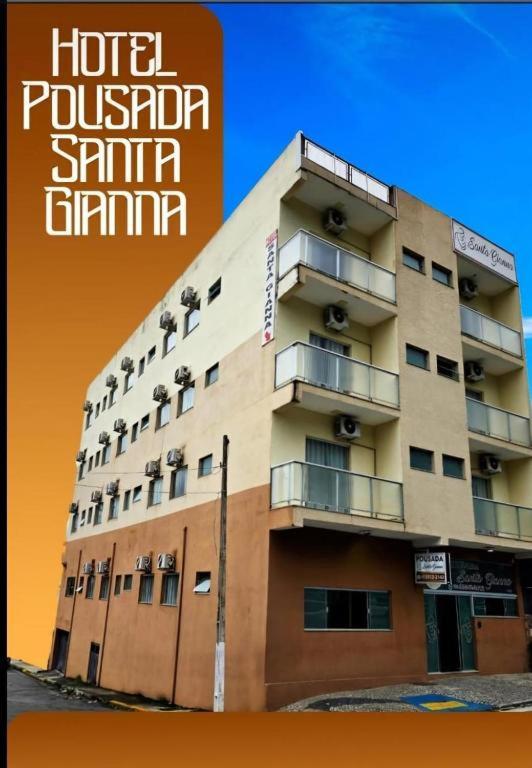 a building with the words hotel pusteria stimuli firm at Pousada Santa Gianna in Aparecida