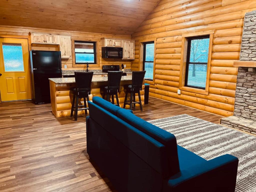 a room with a kitchen and a dining room at Private Bourbon Cabin in Harrodsburg