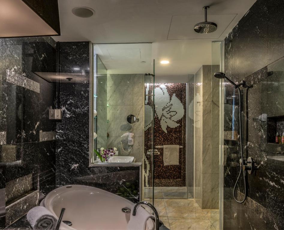 Phòng tắm tại Ascott Raffles Place Singapore