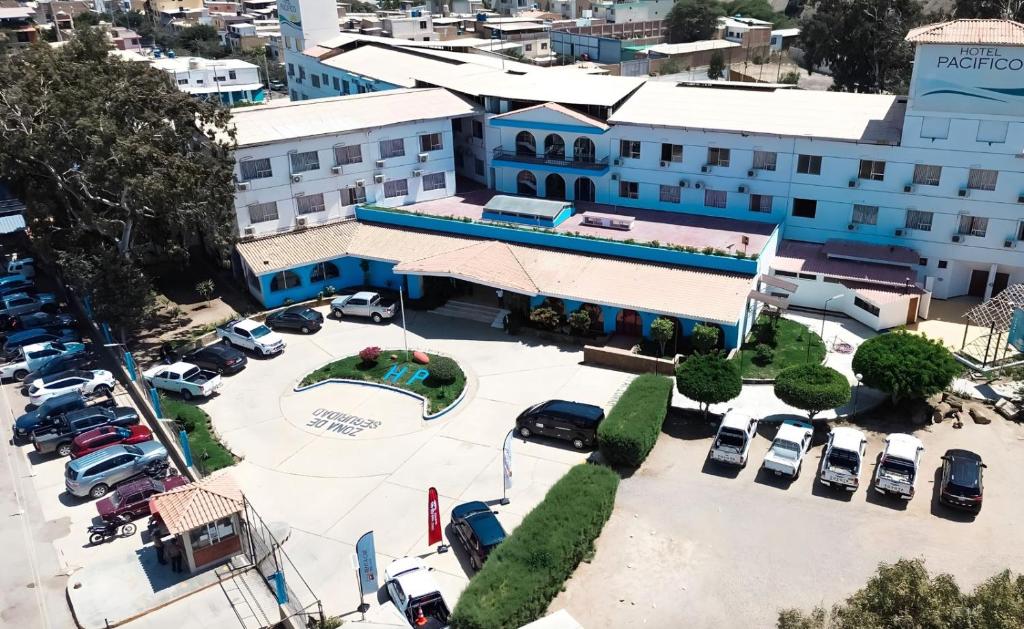 an aerial view of a parking lot in front of a building at Hotel Pacífico Talara in Talara