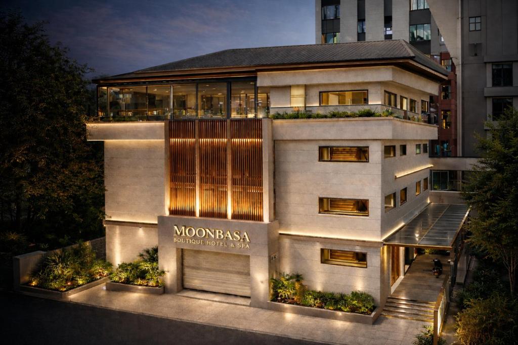 a building with a sign in front of it at MoonBasa Boutique Hotel and Spa Infopark , Kakkanad in Cochin