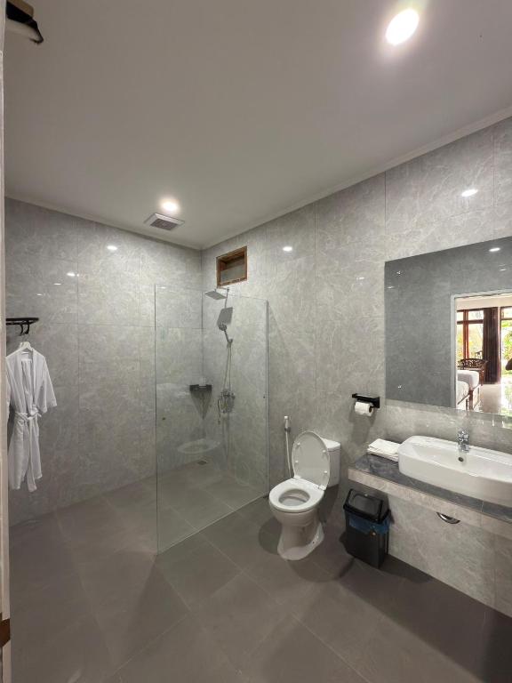Hariara Guest House - Deluxe Driepersoonskamer