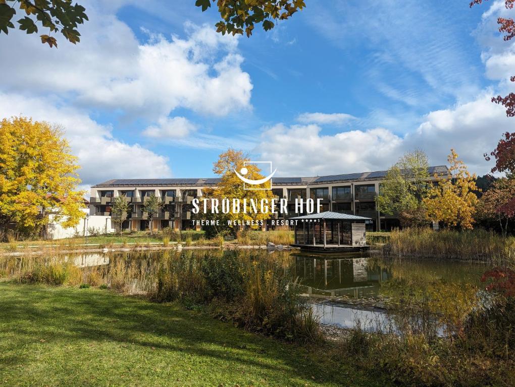 a building with a sign that reads strawberry hog at Ströbinger Hof - Therme Wellness Resort in Bad Endorf