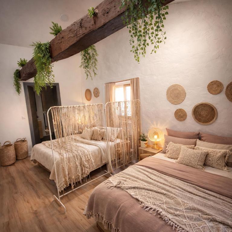 a bedroom with two beds in a room at Casa de Pedra in Melide