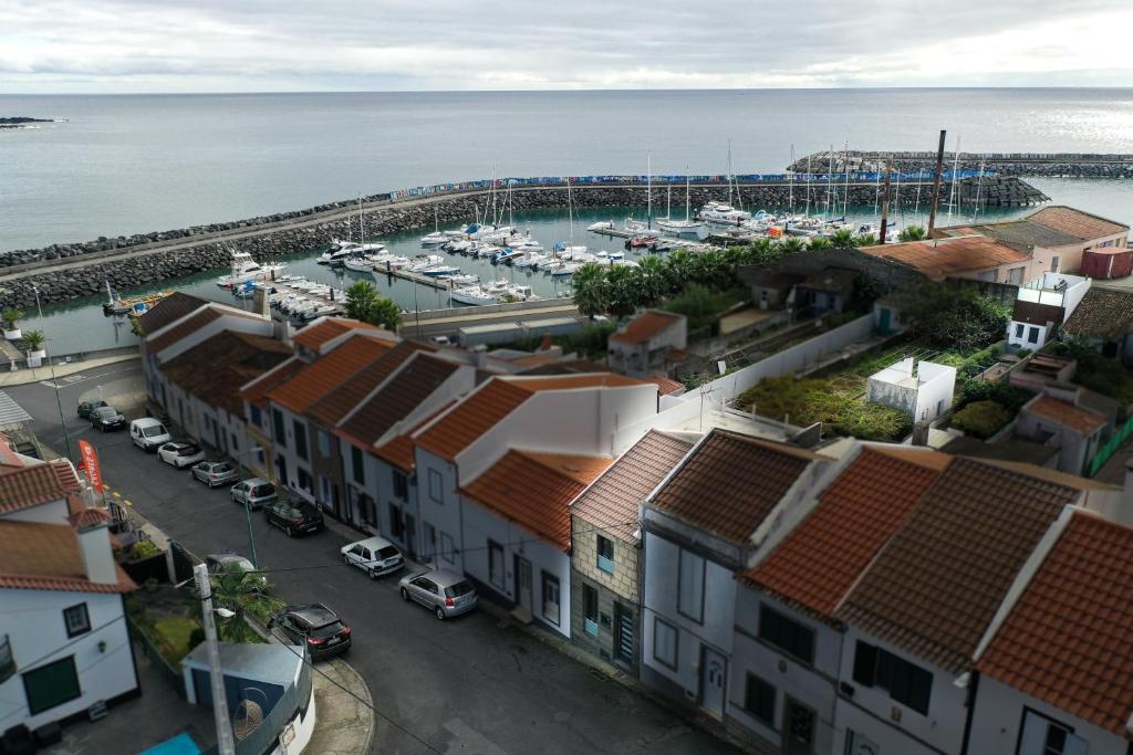 an aerial view of a town with a marina at Porta 29 in Vila Franca do Campo