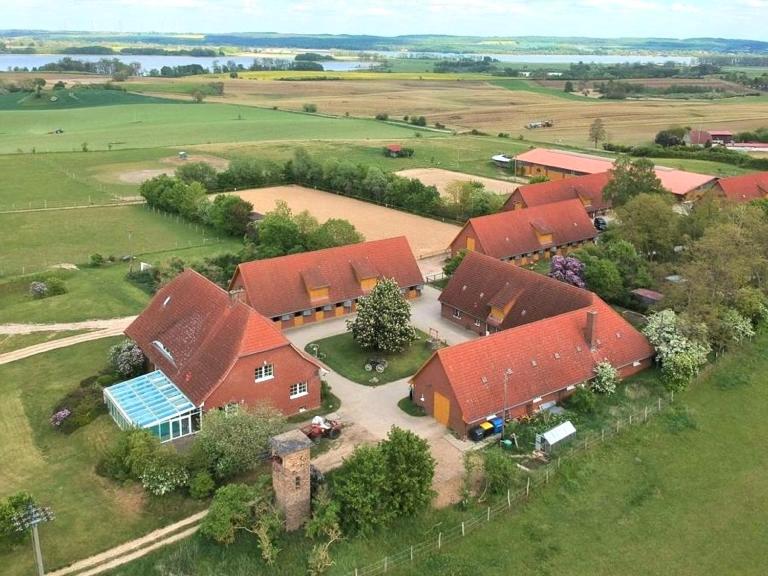 an aerial view of a farm with red roofs at Pferdehof Ruhnau in Potzlow