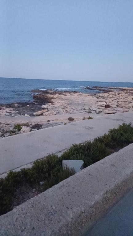 a view of a beach with the ocean at Maltese Sunshine in Naxxar