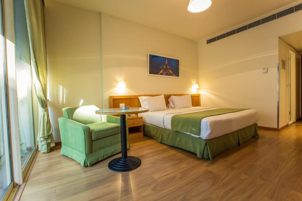 Postel nebo postele na pokoji v ubytování Hotel Cavalier