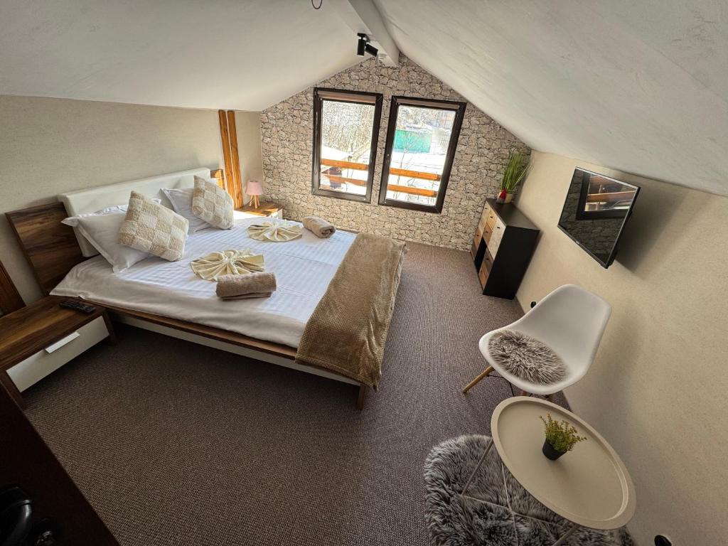 an overhead view of a bedroom with a bed at Delight House in Samokov