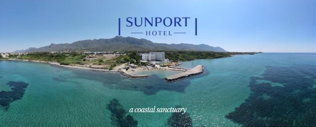 an aerial view of an island in the water at Sunport Hotel in Kyrenia