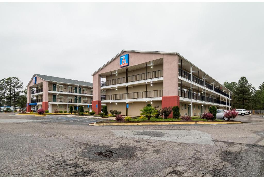a parking lot in front of a large building at Studio 6 Extended Stay - Augusta, GA - Fort Gordon in Augusta