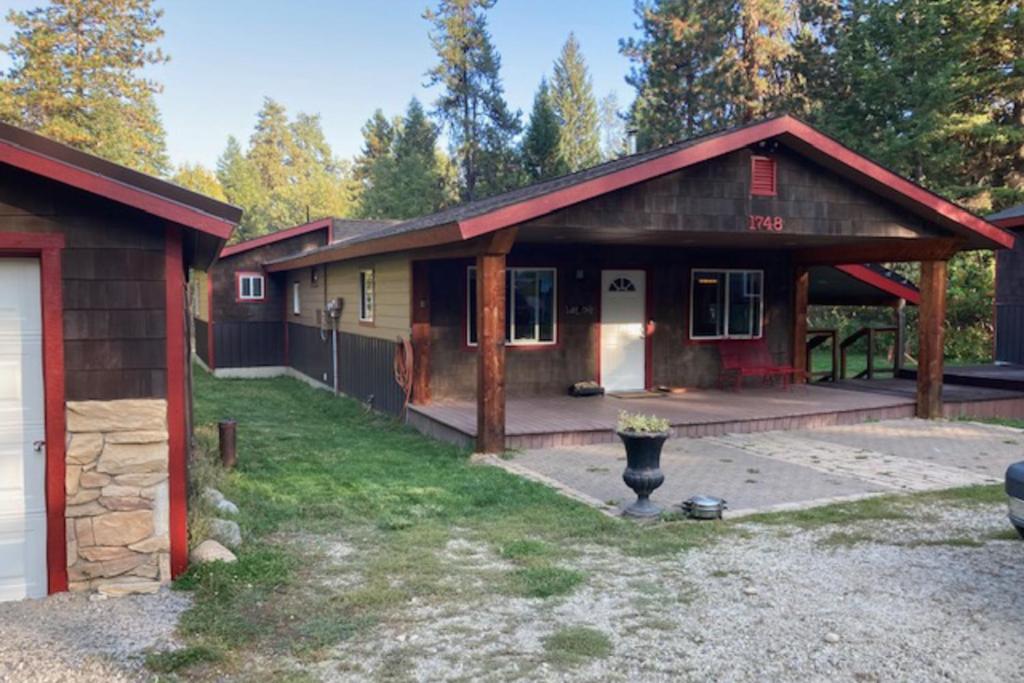 a house with a porch and a garage at Home w/ Hot Tub, 3 Mi to Lake & Ponderosa Park in McCall