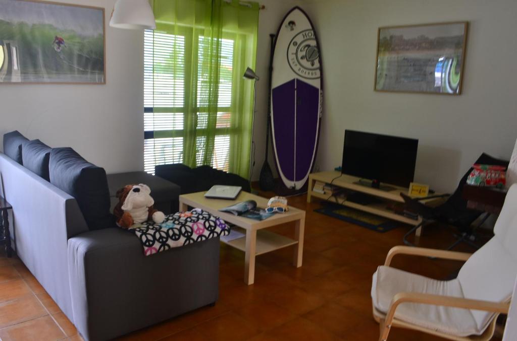 TV a/nebo společenská místnost v ubytování Surf House Peniche
