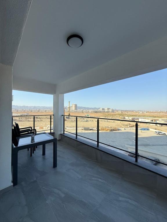 a living room with a view of the desert at Caesar Resort & SPA - Apartments with 1 Bedroom in Iskele