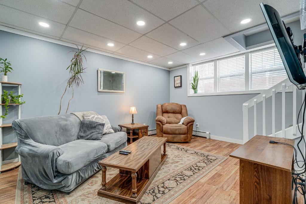 a living room with a couch and a table at Downtown Casper Gem! Super Walkable Apartment in Casper