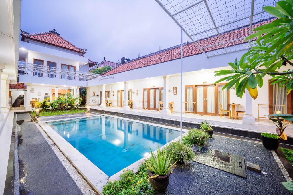 an image of a swimming pool in a house at MIMU C-O Living in Kerobokan