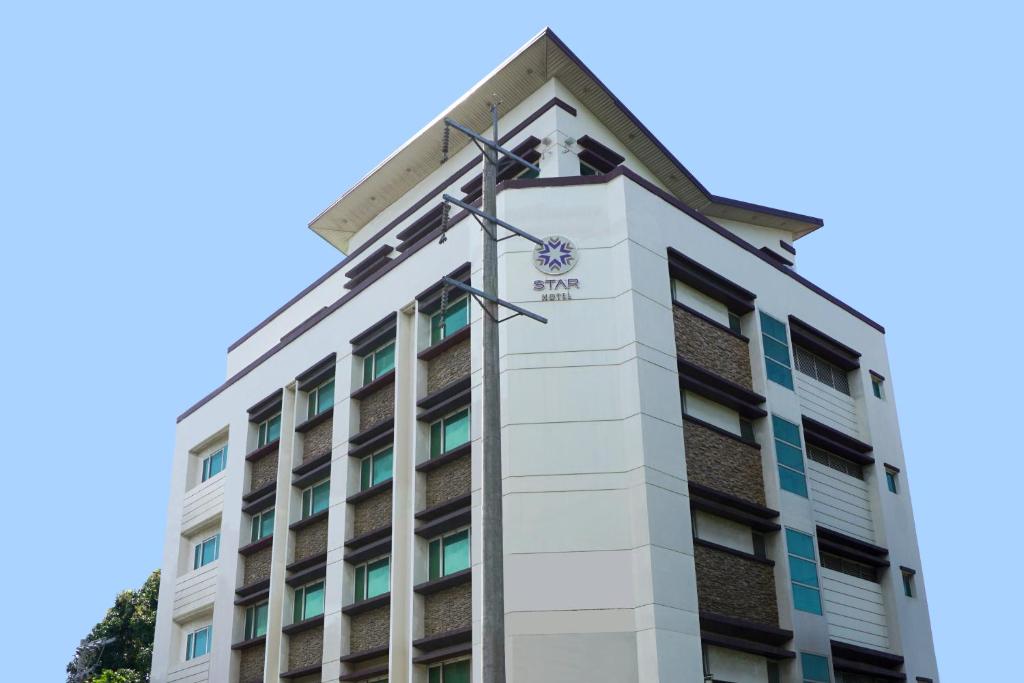 a building with a star on the top at Star Hotel Davao in Davao City