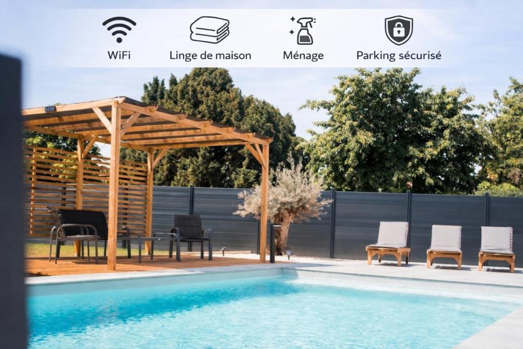 a pool with a pergola next to a swimming pool at Résidence des Sables in Mably
