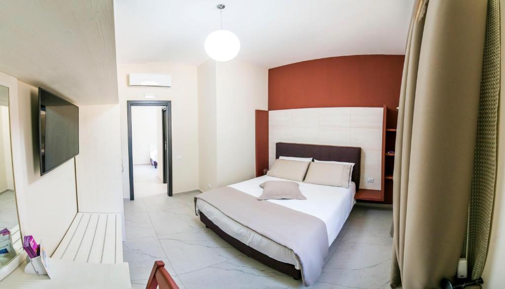 Postel nebo postele na pokoji v ubytování Agriturismo Borgo Imperiale