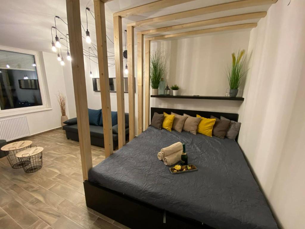 a bedroom with a large bed in a room at Loft2 Apartman X ker in Budapest