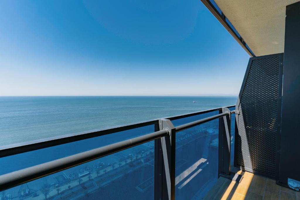 a balcony with a view of the ocean at Hotel sea view in Batumi