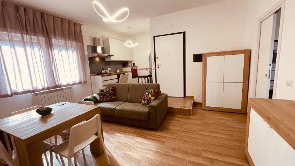 a living room with a couch and a table at La Contessa Home in Avellino