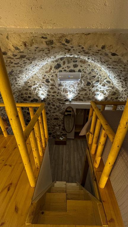 an overhead view of a room with a ceiling at Sadarmis Houses in Leonidio