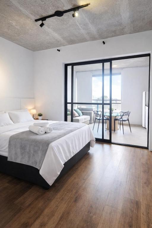 Llit o llits en una habitació de Studio espaço Bom Retiro