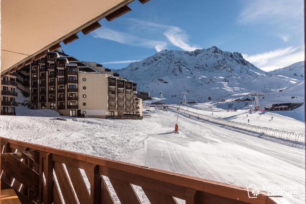 a view of a snow covered mountain from a balcony at D2 Luxury Chalet Mountain View Sleeps 12 Coffee in Val Thorens
