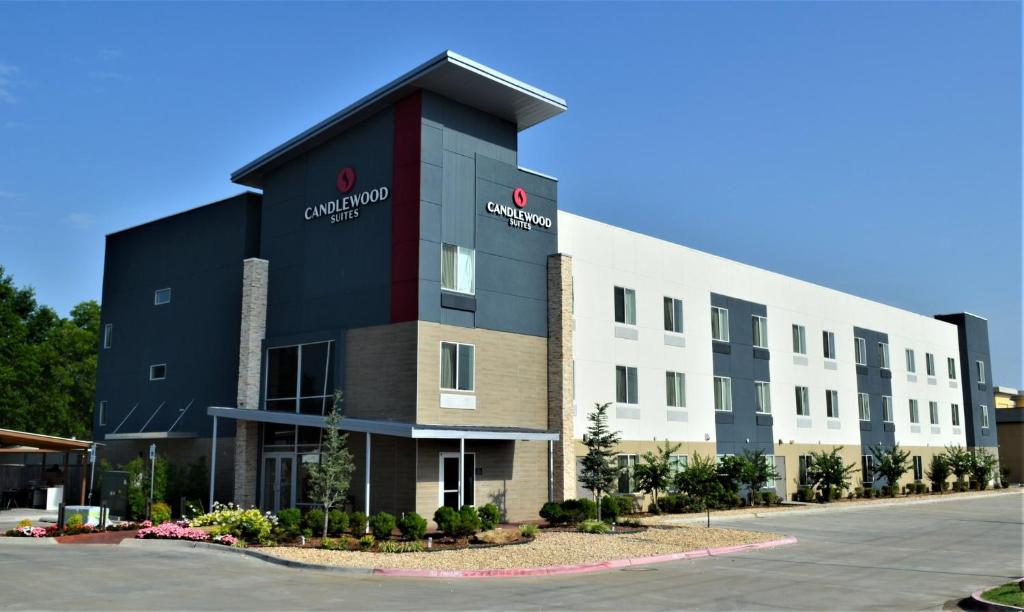 a rendering of the front of a building at Candlewood Suites - Muskogee by IHG in Muskogee