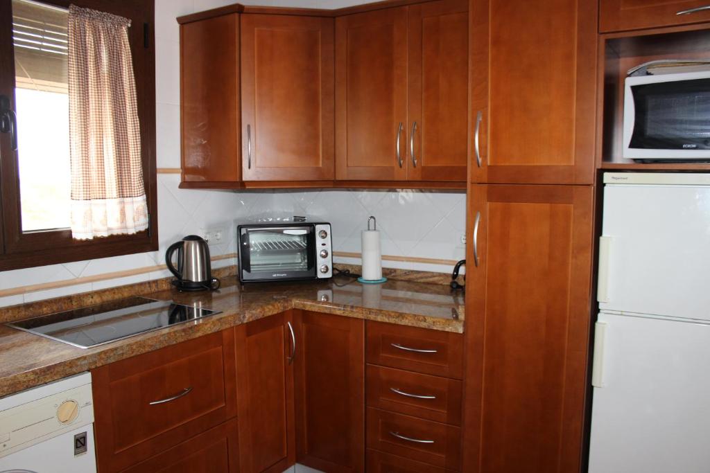Kuchyň nebo kuchyňský kout v ubytování Casa Familiar in Punta Lara