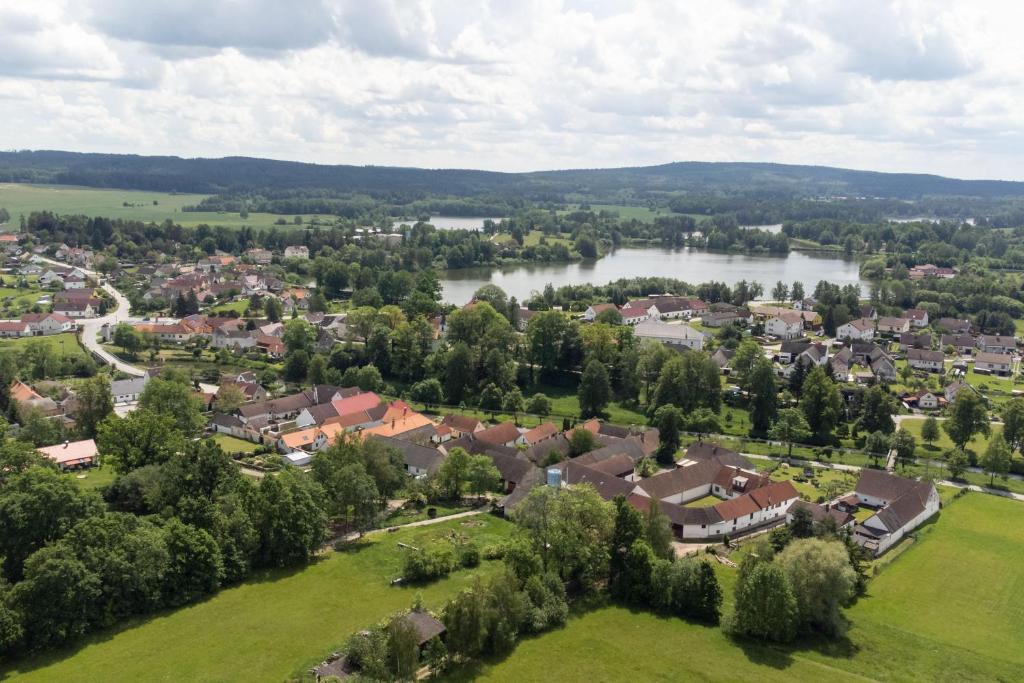 an aerial view of a town next to a river at Chalupa U Lávky in Lasenitz