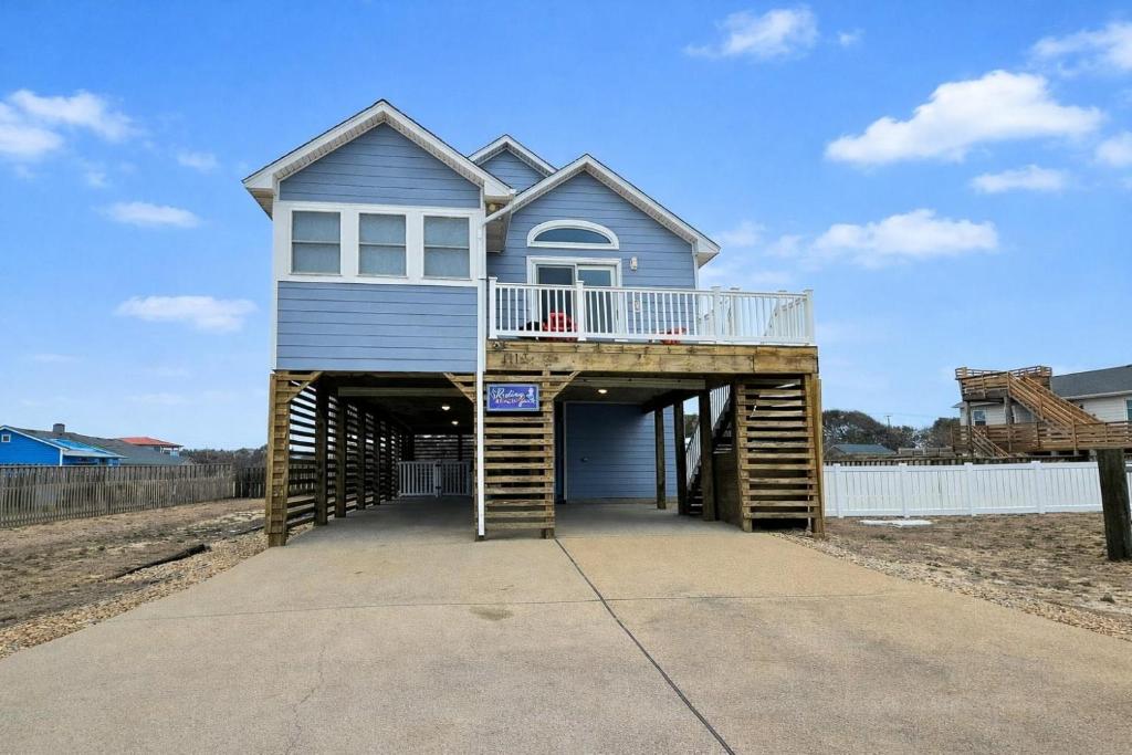 a house sitting on top of a garage at KH4112-Resting Beach Face in Kitty Hawk