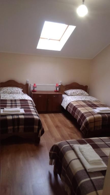 Postel nebo postele na pokoji v ubytování City Hostel