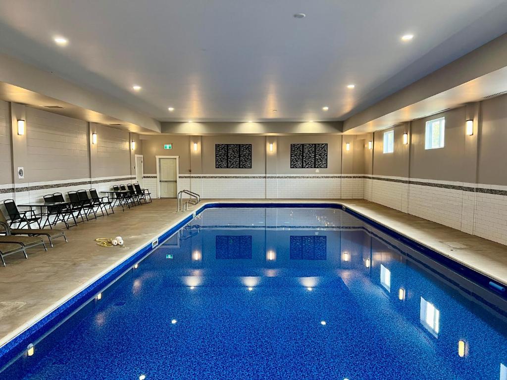 Piscina a Seely's Motel o a prop