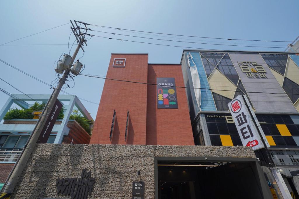 a group of buildings on a street at Incheon No25 Hotel Seogu in Incheon
