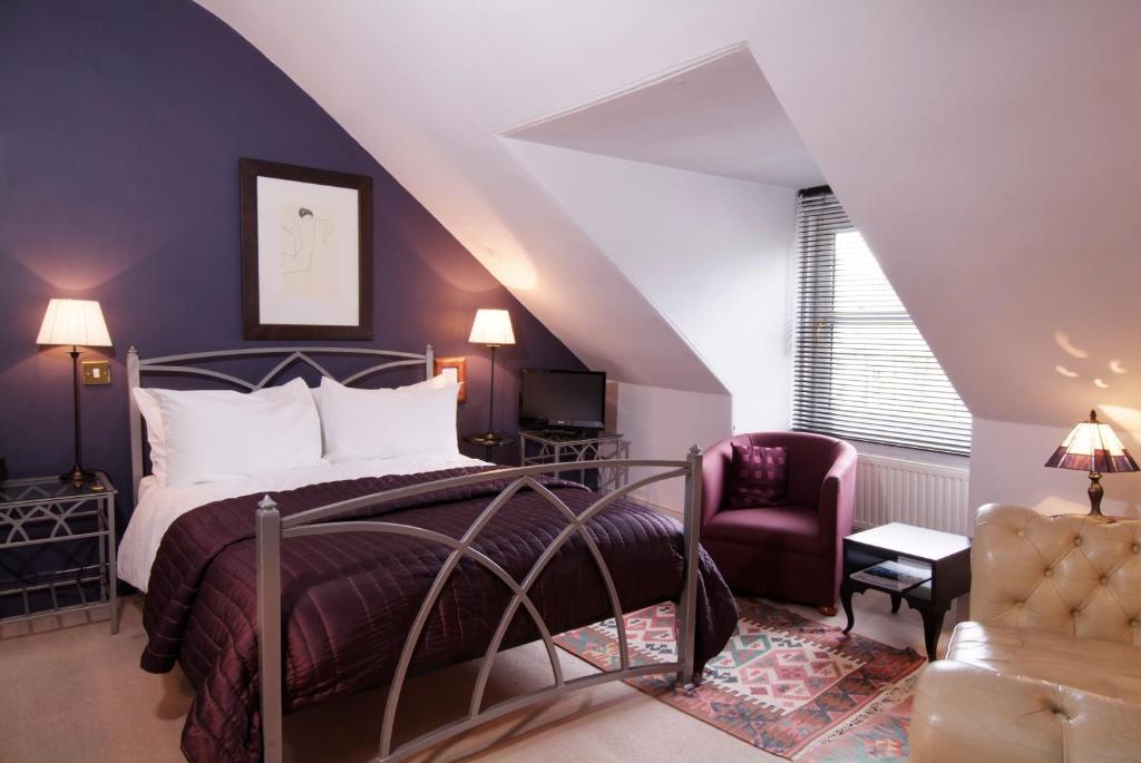Postel nebo postele na pokoji v ubytování Southside Guest House